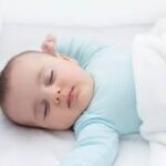 Why Do Babies Smile in Their Sleep?